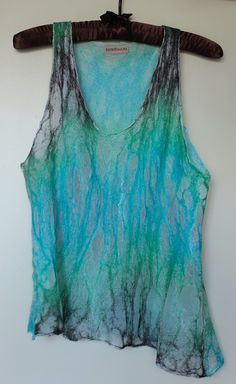 Nuno felted camisole. Very feminine and flowy! Nuno felt is a great place to start...though I think I would start with a scarf.