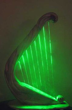 Custom carved Laser Harp, with 8 low powered green lasers. Created for Trans-Studio Science Center, in Indonesia.