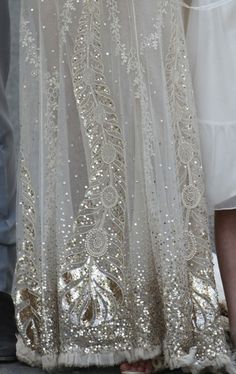 peacock sequined details - Kate Moss' wedding gown by john galliano