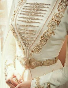 Steampunk wedding gown or jacket. (IMO, it'd go just super with my white patent leather majorette hat.)