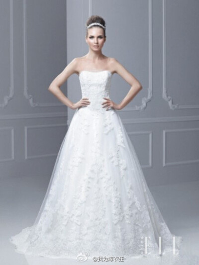 Enzoani Bridal 2015春夏新款婚纱，秉承一贯高贵典雅的风格，回归传统纯白色婚纱礼服，将褶皱充分运用在裙摆上，让古典宫廷样式与现代简约感充分结合在一起。