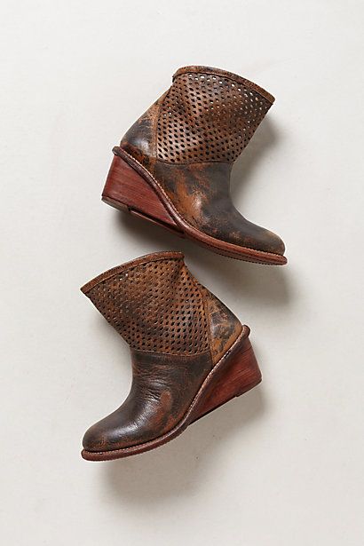 .Anthro. Perforated wedge booties http://www.anthropologie.com/anthro/product/shoes-boots/28748317.jsp?cm_mmc=CJ-_-Affiliates-_-rewardStyle-_-11292623_medium=rewardStyle_source=AFFILIATES_content=rewardStyle