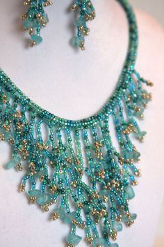 Marine aqua coraling necklace and earring set by Beadgardener, $59.00