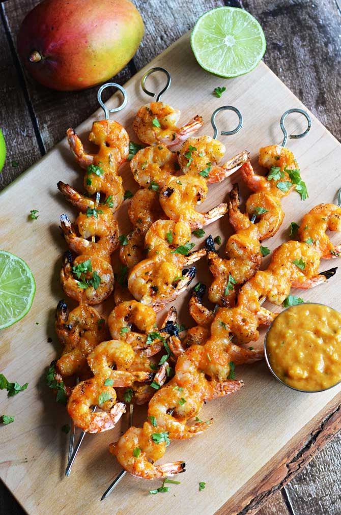 Mango Chile Glazed Shrimp. Sweet, spicy, and grilled to perfection, these shrimp will be a new summer favorite! | blog.hostthetoast.com