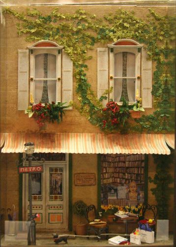 Dolls House Scale Windowbox Displays: Flat backdrop quarter scale Paris street scene in a windowbox frame by Charlotte Atcher exhibited at the Fall 2009 Seattle Dollhouse Miniature show.