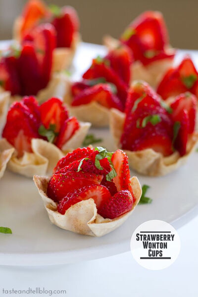 Strawberry Wonton Cups Recipe ~ The perfect spring and summer sweet appetizer - sugared wonton cups are baked and filled with a cream cheese mixture, then topped with fresh strawberries and mint.