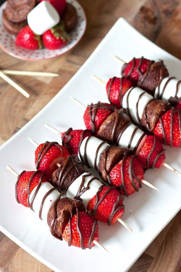 Fresh Stawberries, marshmallows, a soft toffee filled chocolate. Put them together and drizzle with melted chocolate and you have a party on a stick!