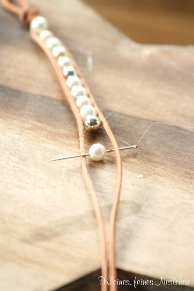 pearl wrap bracelet with either white or natural leather. pretty and wearable after wedding