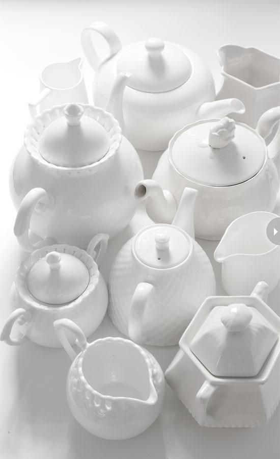 Enjoy a relaxing cup of tea with these simple white teapots.