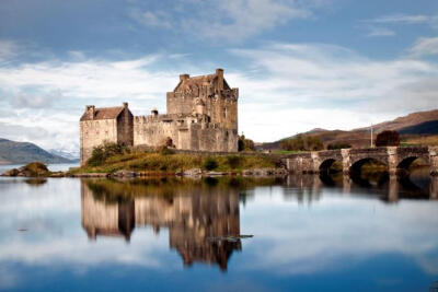 EILEAN DONAN, SCOTLAND Brooding, solitary, rugged…and that's just the gatekeeper. Eilean Donan, perched atop an island on Loch Duich, is the castle that launched a thousand Scottish tourist brochures…