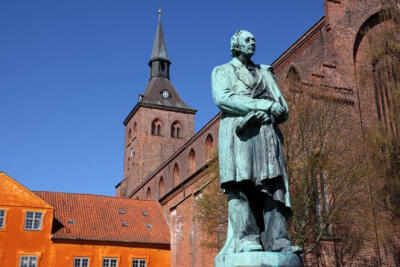 ODENSE, DENMARK The chirpy city of Odense is Hans Christian Andersen crazy: sculptures of trolls lounge on street corners, duckling-and-swan mobiles dangle from gift-shop windows, and lights at pedest…