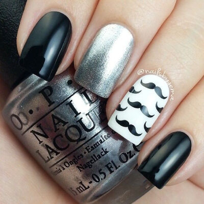 Moustache nails with the new Gwen OPI Silver for Movember. @nailsbyjema