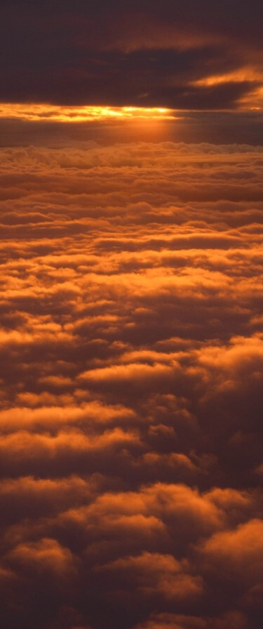 Sunset on the clouds over Seatlle • photo: JD Hascup on Flickr