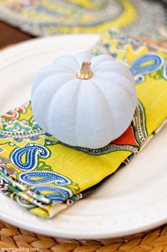 Vintage painted pumpkin place settings with Venice Paisley Napkins and Nantucket Dinnerware from #WorldMarket