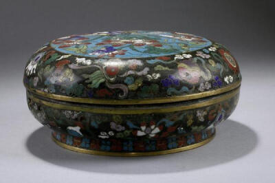 CHINESE CLOISONNE ROUND BOX WITH COVER From the Collection of a Gentleman from England. Decorated in gilt with meandering flowers and tendrils. Diameter: 8 in.(20.3cm) x H: 3 5/8 in.(9.3cm)