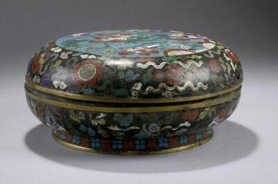 CHINESE CLOISONNE ROUND BOX WITH COVER From the Collection of a Gentleman from England. Decorated in gilt with meandering flowers and tendrils. Diameter: 8 in.(20.3cm) x H: 3 5/8 in.(9.3cm)