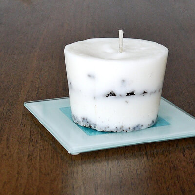 Coffee Grounds Candle Use old coffee grands and the ends of old candles to create this awesome coffee candle.