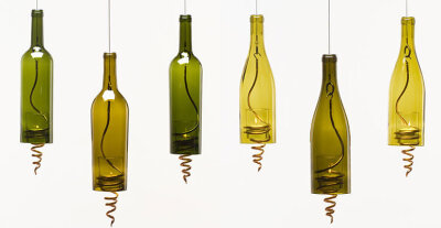 Wine Bottle Lamps Lighten up a room or patio with this unique look. To get it yourself, you'll need something like a steel cable to hang it from and a spiral (or other adornment) to peek out from the …