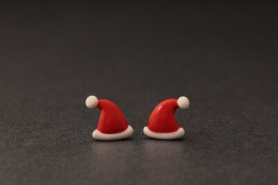 Santa Hat Earrings, Christmas Cute Studs, Polymer Clay Holiday Fashion. $20.50, via Etsy.