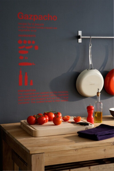 I like the idea of hanging pans on a towel rack for visual element in the kitchen