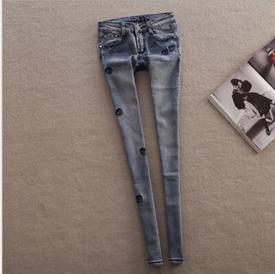 2014新款韩版蓝色做旧水洗显瘦提臀兜兜修身小骷髅小脚牛仔裤