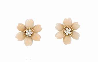 PROPERTY OF A LADY OF TITLE: A PAIR OF 'ROSE DE NOEL' CORAL AND DIAMOND EAR CLIPS, BY VAN CLEEF &amp;amp; ARPELS. Each modelled as a single flowerhead, with brilliant-cut diamond cluster centre, to a carved pale pink coral six petal surround.