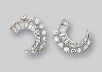 PAIR OF DIAMOND EARCLIPS/DRESS CLIPS, VAN CLEEF &amp;amp; ARPELS, CIRCA 1950. The crescents set with 12 round and 32 baguette diamonds weighing approximately 5.00 carats, mounted in platinum, signed Van Cleef &amp;amp; Arpels, numbered N.Y. 19792, clip backs have retractable pins.