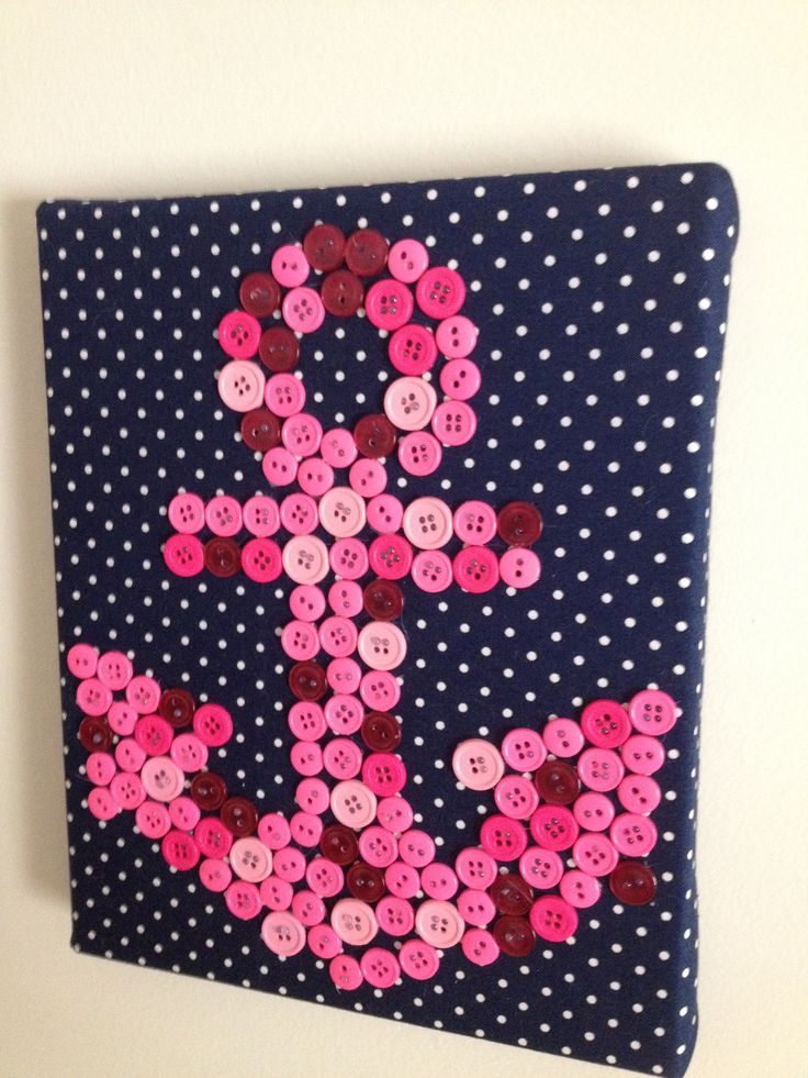 anchor craft ~  sororitycraft: I covered a thick canvas with fabric and glued the buttons on with hot glue. You could sew them, but it would take much longer. I’ve also seen this hung with a ribbon, and I’ve seen them where each letter is on a different canvas and they’re hung together.