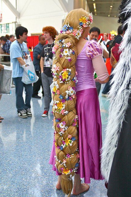 Most incredible rapunzel wig ive ever seen for cosplay EVER. Looks like it stepped straight out of the movie. Made with flexible tubing inside with hair wrapped around, makes the thickness even more noticeable.