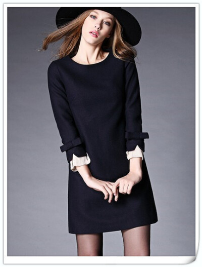 看人家连衣裙多么淡定，虽然对蝴蝶结喜欢的不得了，但是人家依旧低调，把蝴蝶结安排在袖口，满满的欢喜之情想藏也藏不住。大气有型的色彩，直接利落的款式，修身卖萌减龄不忘气质。