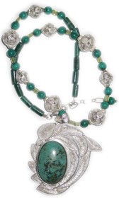 Enchanting sterling silver filigree malachite dolphin necklace.