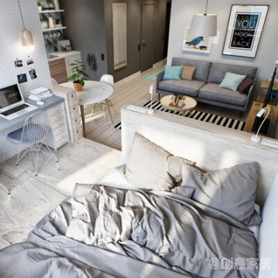 这是一款由设计师int2 architecture活力清新的小公寓，淡色木质与灰色清爽简单，小面积的亮色点缀空间，充满活力，小空间里避免了用厚实的墙壁做区域分隔，半开放式的空间将卧室安放于客厅一角，同时还是一个工作室…