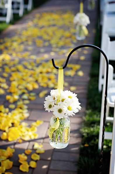 Shepherd Hooks with Mason Jar Arrangements.