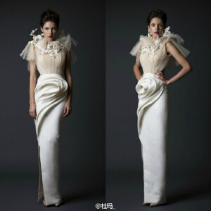 什么叫落入凡间的天使，看了Krikor Jabotian 2014 - 2015秋冬系列，你自会找到答案。裙摆的蓬松、香肩上的设计细节等等，都让你舍不得碰触这一件件艺术品。就连酷酷的连身裤也不失华丽感。