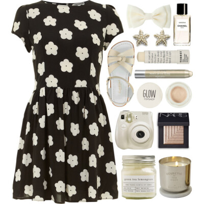 A fashion look from February 2015 featuring black tee shirt dress, starfish earrings and hair bows. Browse and shop related looks.