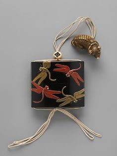 Case (Inrô) with Design of Dragonflies Kôami Nagataka (dates unknown) (Japanese) Period: Edo period (1615–1868) Date: mid-18th century Culture: Japan Medium: Case: gold and red lacquer on black lacqu…