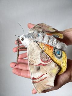 Yumi Okita -- fabric and embroidered insects .. .click to see more of these amazing works of art!