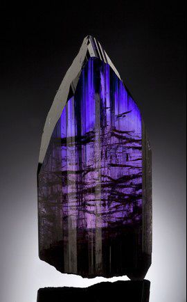 Tanzanite :: Since tanzanite is a gem stone, it's rare to find a crystal like this one. Ka-ching! Measures: 4 1/8&amp;quot; x 1 7/8&amp;quot; x 3/4&amp;quot; Estimate: $ 300,000-$ 350,000