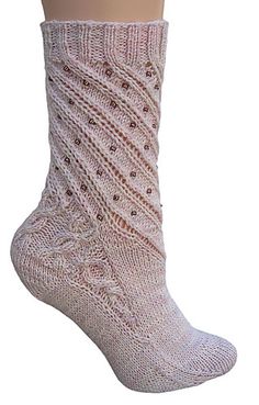 Miss Margaret Socks. The heel on this is my favorite part. That and the way the knit ribbing drizzles into the spiraling stitches. Also, the decorated arch detail is in full force here. Must get away …