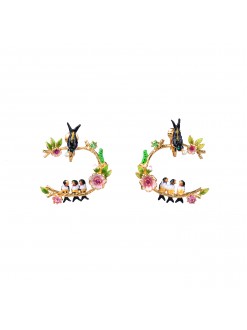 Boucles d'oreilles clip hirondelle et hirondeaux sur leur branche fleurie