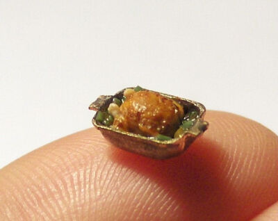 Quarter scale chicken in casserole thx for object for scale:-)