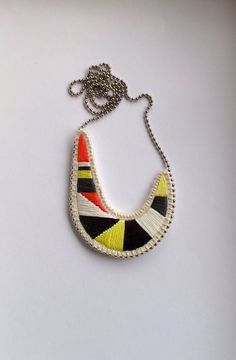 Asymmetrical crescent necklace embroidered by AnAstridEndeavor