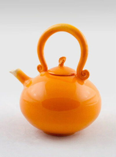 Handmade Pottery Collection Teapot Ceramic Orange with Leaf Handle. $178.00, via Etsy.