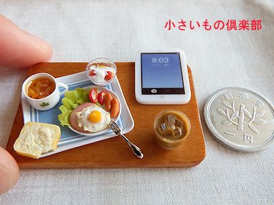 So many gorgeous food miniatures, but this stands out for the addition of the iPad.