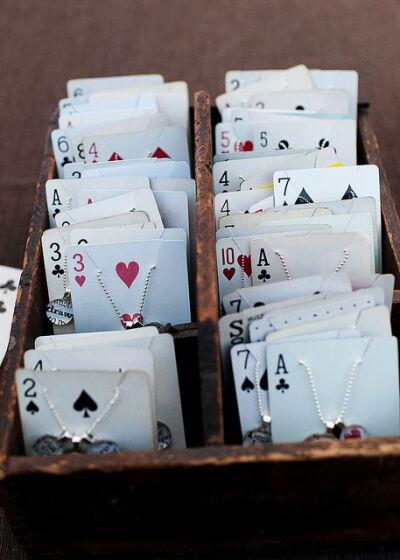 Use playing cards for storing or displaying jewelry! CUTE.