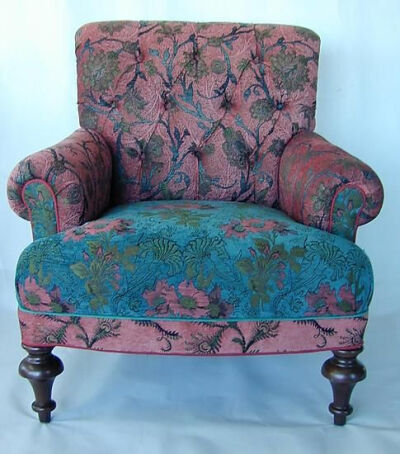 Gorgeous chair upholstered in turquoise and purple