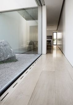 John Pawson House London - I would like some plant life in with the zen garden but the light well effect is excellent