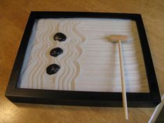 Project 33. Picture frame + sand + stone = miniature zen garden • DIY project by DIY Maven, via Curbly