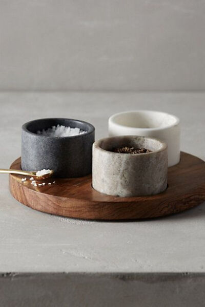 Spice pots in wooden dish