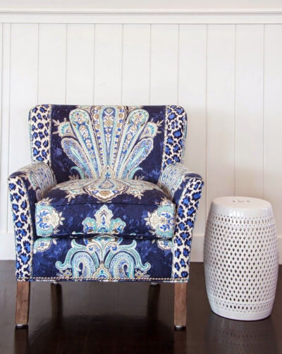 This printed chair has been beautifully upholstered and reflects the symmetry of the pattern
